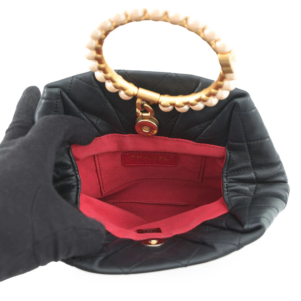 Chanel Black Quilted Hexagon Pearl Handle Bag