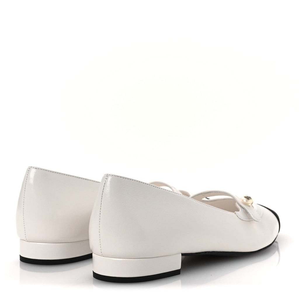 Chanel Two-Tone Cap-Toe Pumps
